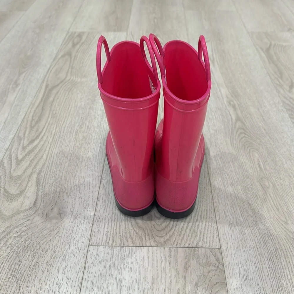 Pink rain boots